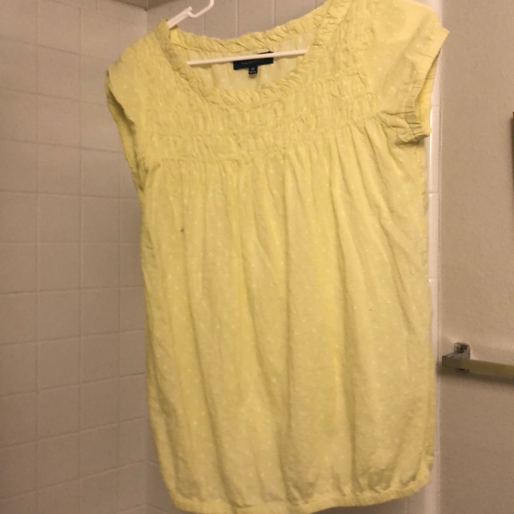 Bright yellow blouse